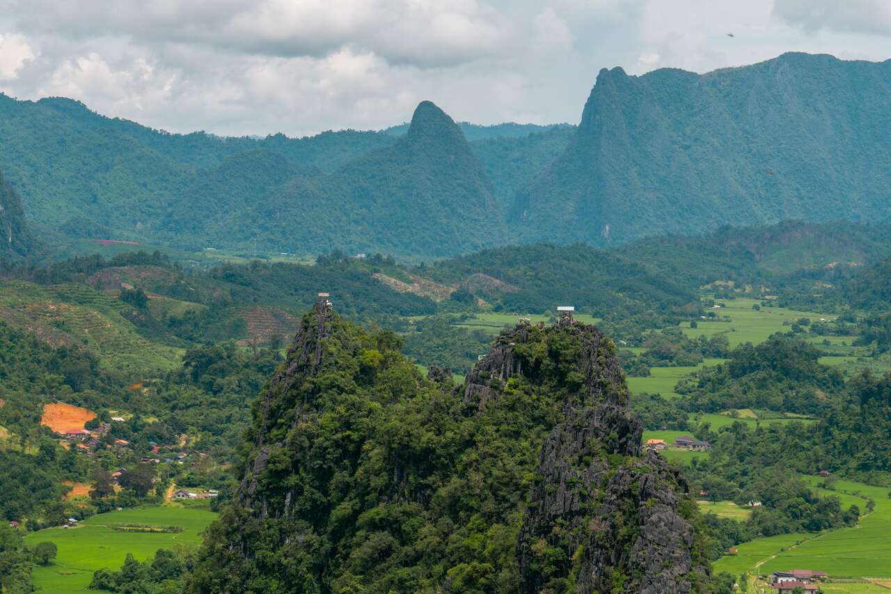 Begin your historical exploration with Vang Vieng’s tranquil ambiance